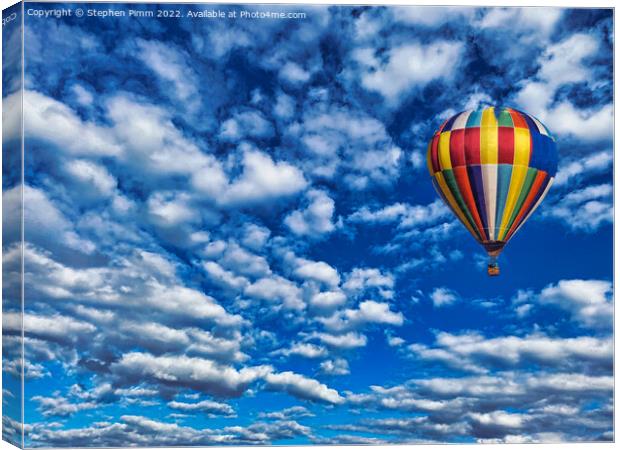 A colorful ballon flying in the sky Canvas Print by Stephen Pimm