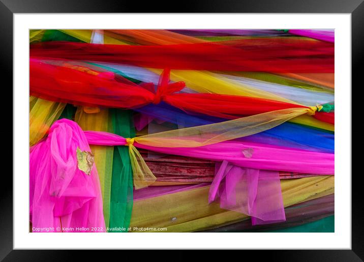 Sacred ribbons around a Bodhi tree Framed Mounted Print by Kevin Hellon