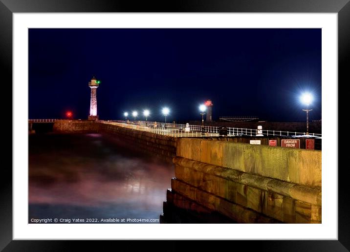 Whitby Lighthouse and Pier Night Shot Framed Mounted Print by Craig Yates