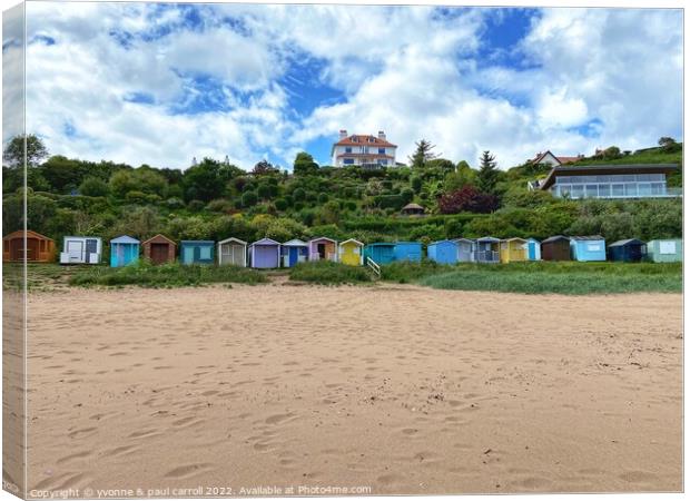Coldingham Bay with it's colourful beach huts Canvas Print by yvonne & paul carroll