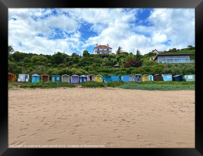 Coldingham Bay with it's colourful beach huts Framed Print by yvonne & paul carroll