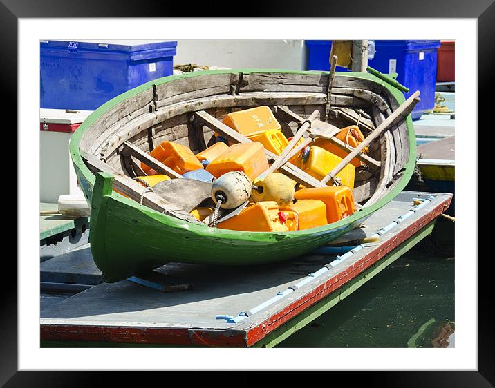 small boat Framed Mounted Print by Hassan Najmy