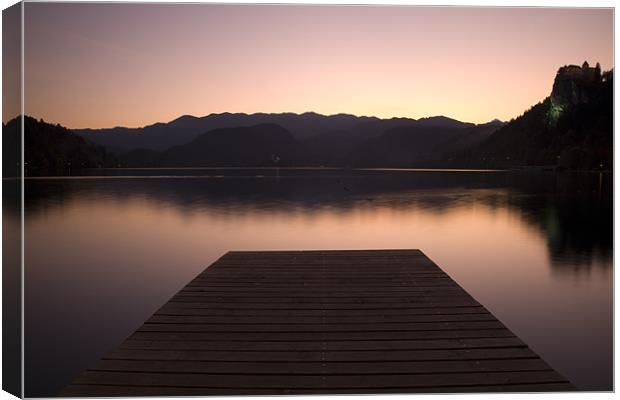 Lake Bled at sunset Canvas Print by Ian Middleton