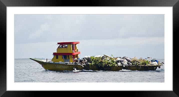wastage boat Framed Mounted Print by Hassan Najmy