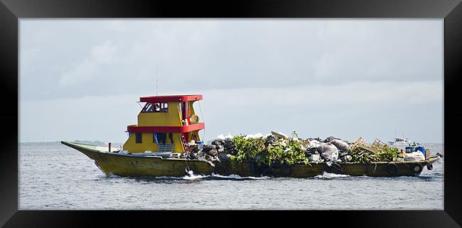 wastage boat Framed Print by Hassan Najmy
