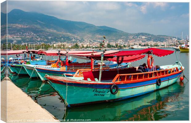 Fishing boats moored in Alanya Harbour, Turkey Canvas Print by Kevin Hellon