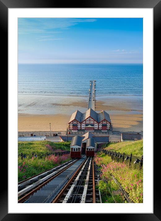 Saltburn cliff lift and pier Framed Mounted Print by Kevin Winter