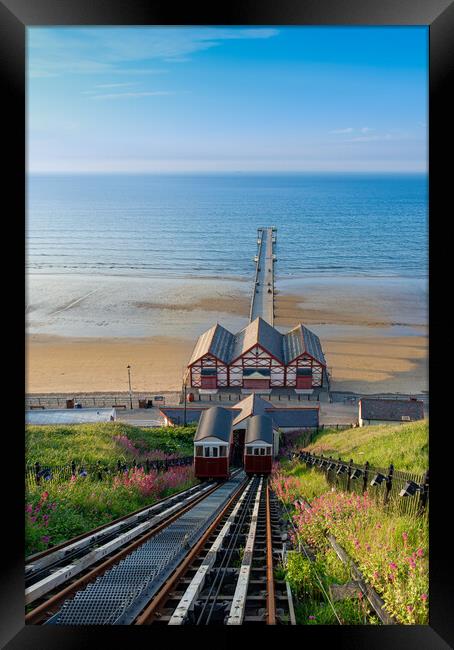 Saltburn cliff lift and pier Framed Print by Kevin Winter
