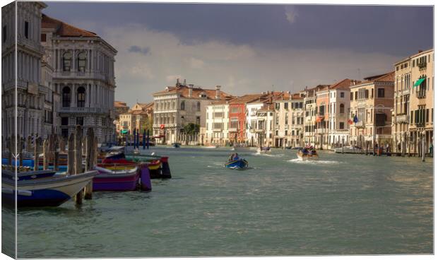 VENICE, ITALY - September 03, 2018: The Grand Canal seen from Rialto Bridge in the morning with boats sailing against typical buildings Canvas Print by Arpan Bhatia