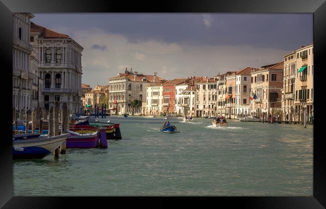 VENICE, ITALY - September 03, 2018: The Grand Canal seen from Rialto Bridge in the morning with boats sailing against typical buildings Framed Print by Arpan Bhatia