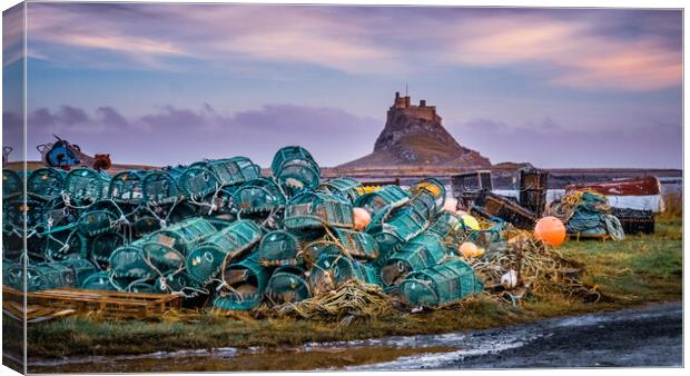 Lindisfarne Castle and Fishing Creels Canvas Print by John Frid