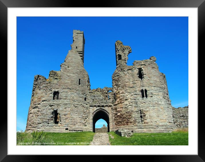 Dunstanburgh castle in northumbria Framed Mounted Print by Philip Openshaw