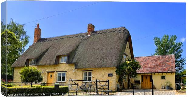 "The" Thatched Cottage Canvas Print by Graham Lathbury