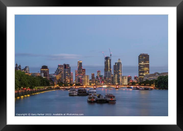 Battersea skyscrapers lit up at Twilight Framed Mounted Print by Gary Parker