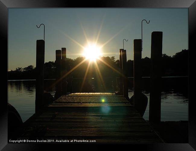 Sunset on the dock Framed Print by Donna Duclos