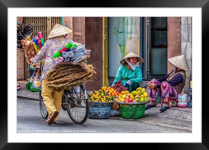 3 street vendors, Ho Chi Minh City, Saigon, Vietnam Framed Mounted Print by Kevin Hellon