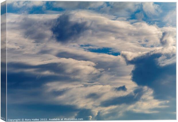 Clouds against a blue sky Canvas Print by Rory Hailes
