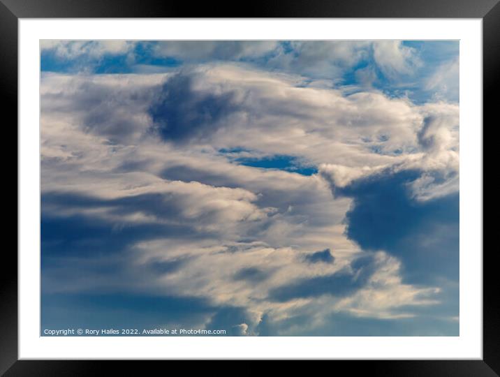 Clouds against a blue sky Framed Mounted Print by Rory Hailes