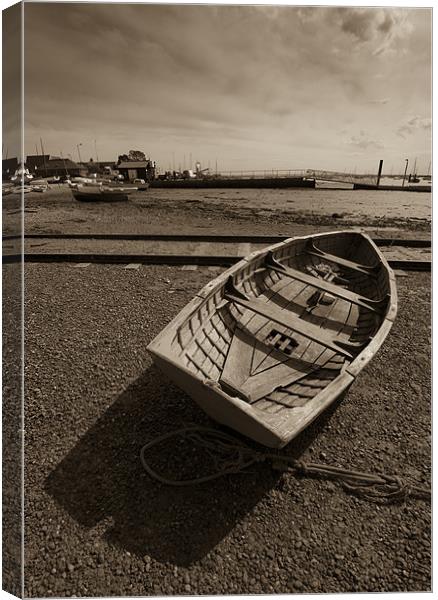 Beached rowing boat, West Mersea Canvas Print by Gary Eason