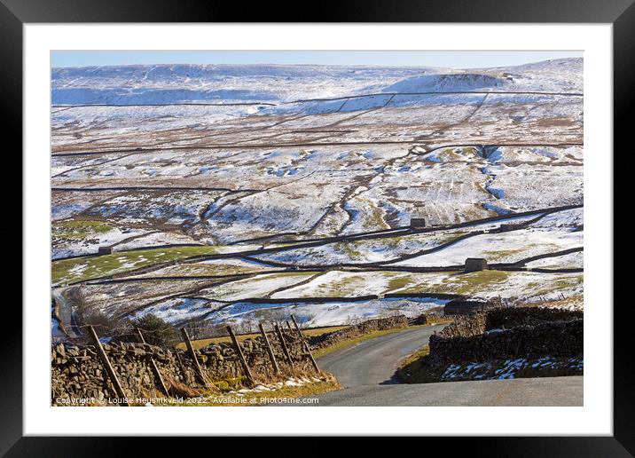 Steep bends on B6270 on a winter day in Swaledale, Yorkshire Framed Mounted Print by Louise Heusinkveld