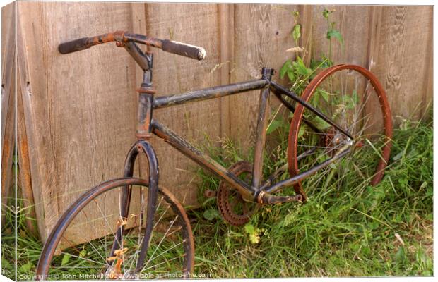 Old Rusty Bike Canvas Print by John Mitchell