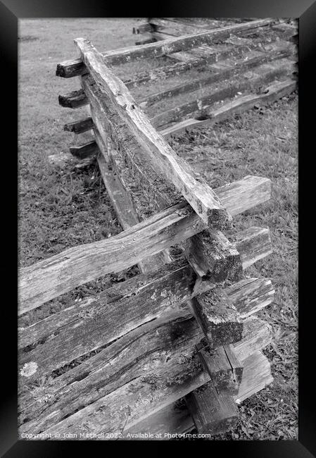 Old Zigzagging Wooden Fence Framed Print by John Mitchell