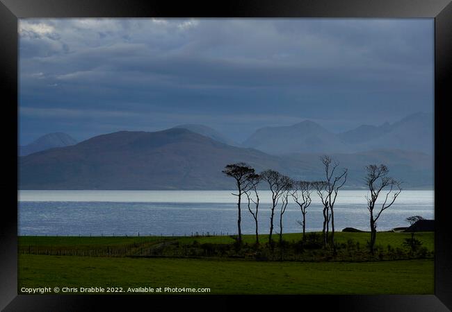 Winter light on Raasay Framed Print by Chris Drabble