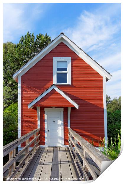 Red Wooden Stilt House Print by John Mitchell