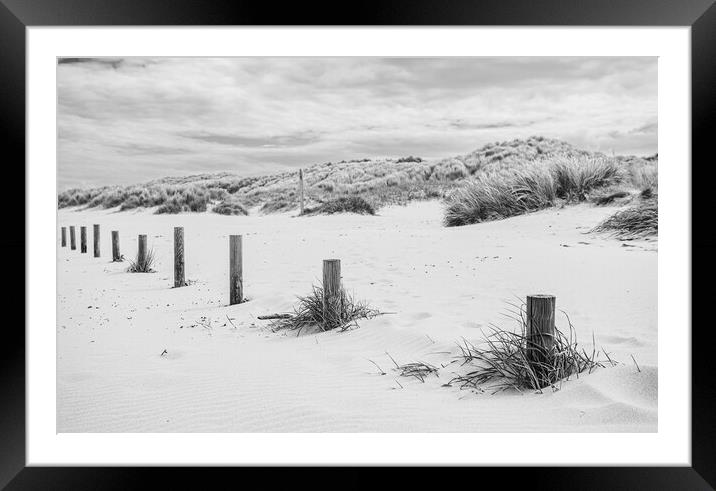 Posts on Ainsdale beach Framed Mounted Print by Jason Wells