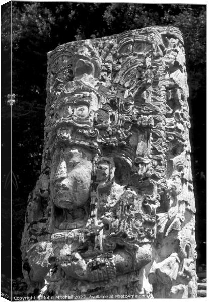 Mayan Sculpture at Copan Honduras Canvas Print by John Mitchell