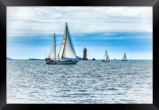 Sail into the horizon Framed Print by Roger Mechan
