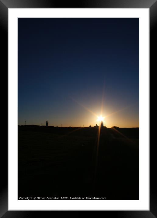 Sunlight through the Nash Point Lighthouse  Framed Mounted Print by Simon Connellan
