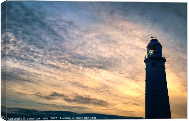 Sunset on Nash Point Lighthouse  Canvas Print by Simon Connellan