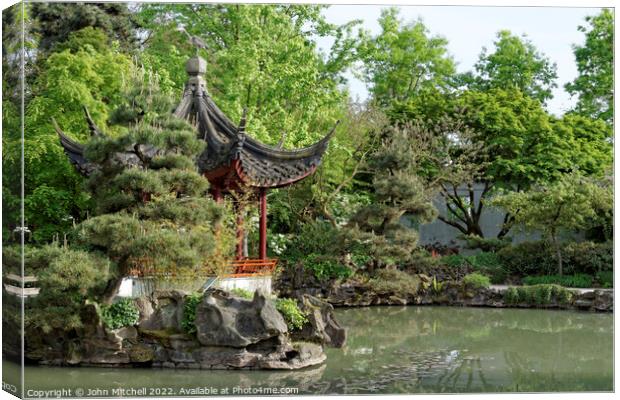 Pagoda and pond in Vancouver's Chinatown Canvas Print by John Mitchell