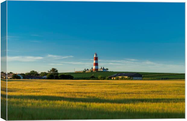 Happisburgh lighthouse, in evening light, 21st June 2022 Canvas Print by Andrew Sharpe