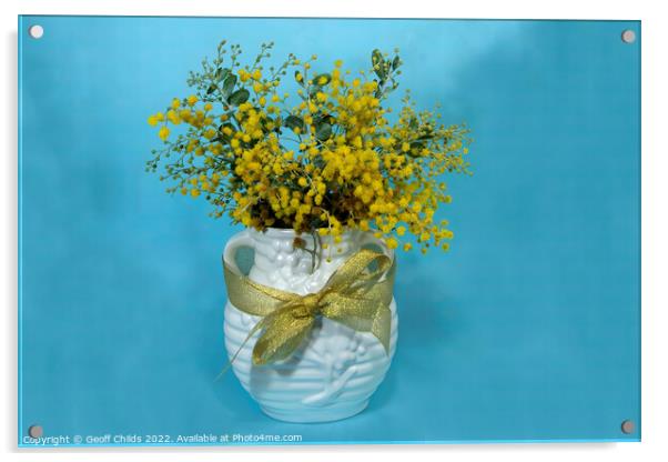 Wattle blossoms in a ceramic vase on blue. Acrylic by Geoff Childs
