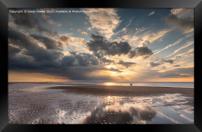 Sunset Reflections on Brancaster Beach Framed Print by David Powley