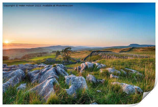 Sunset with clear blue skies over a limestone pavement at the Wi Print by Helen Hotson