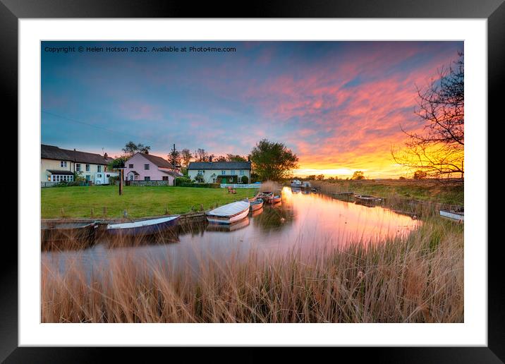 Stunning sunset over the village green and boats on the river at Framed Mounted Print by Helen Hotson
