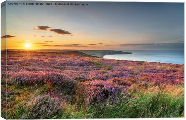 Sunset over heather in bloom on the North York Moors National Pa Canvas Print by Helen Hotson