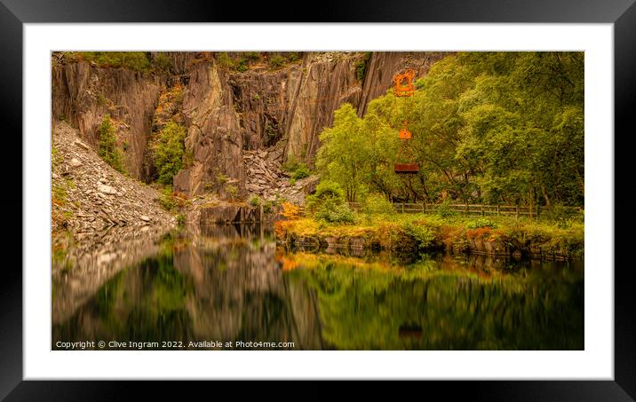 Deep reflections of a Welsh slate quarry Framed Mounted Print by Clive Ingram