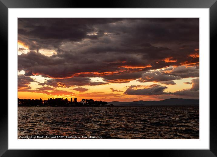 Stormy sky over Supetar Framed Mounted Print by David Aspinall