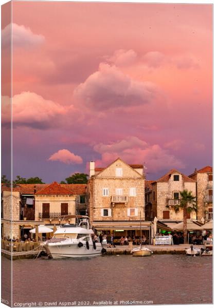 Stormy sky above Supetar Harbour Canvas Print by David Aspinall