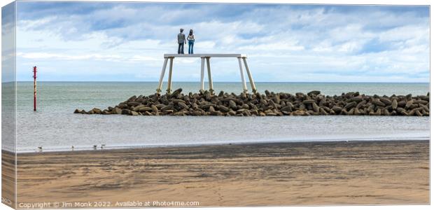 The Couple Statue at Newbiggin By The Sea Canvas Print by Jim Monk