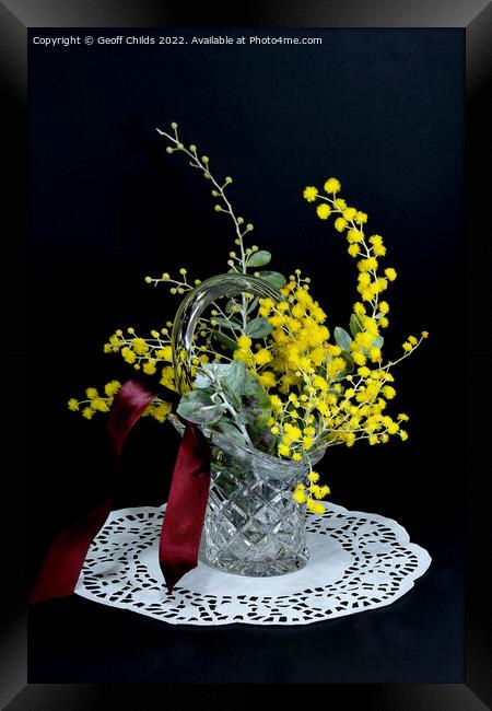 Wattle blossoms in a crystal glass vase vase on black. Wattle da Framed Print by Geoff Childs
