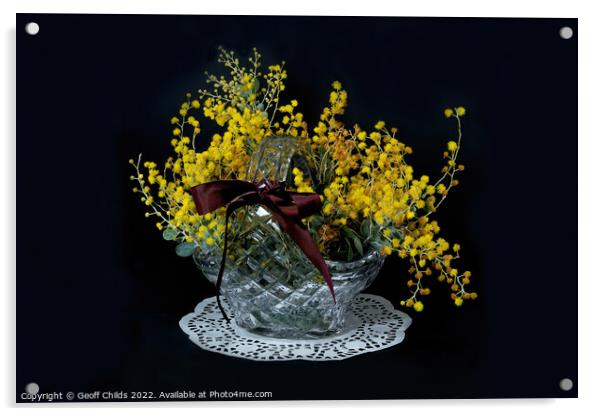 Wattle blossoms in a crystal glass basket vase on black. Wattle  Acrylic by Geoff Childs