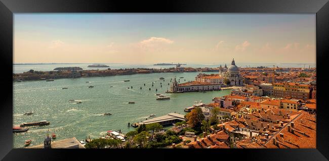 Aerial panorama view of Basilica of Santa Maria della Salute against dramatic sky during day time, located at Punta della Dogana between the Grand Canal and the Giudecca Canal, in Venice, Italy Framed Print by Arpan Bhatia