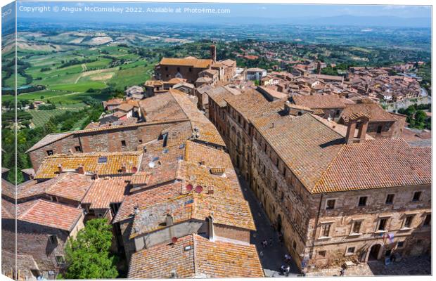 Across the rooftops of Montepulciano, Tuscany Canvas Print by Angus McComiskey