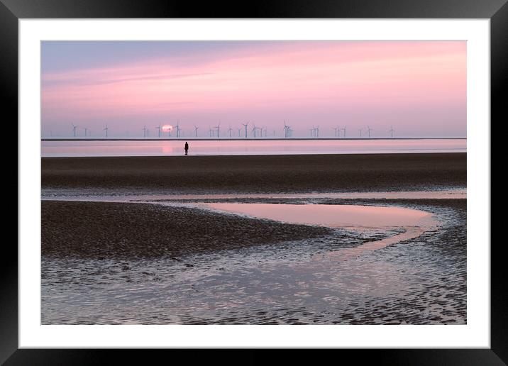 Iron Man watching the sun set Framed Mounted Print by Jason Wells