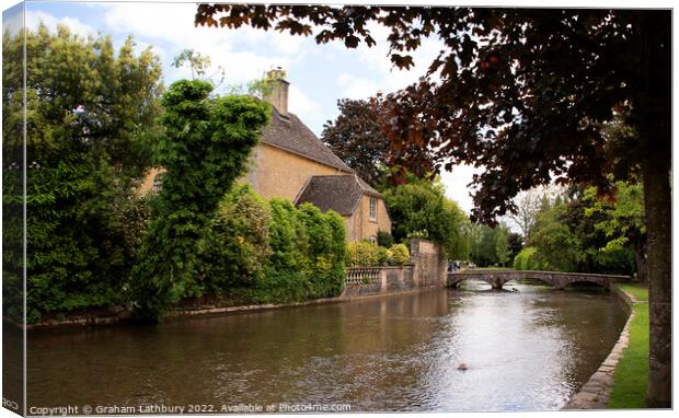 Bourton on the water Canvas Print by Graham Lathbury